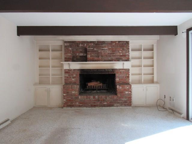 2207 Hall Drive Export, PA 15632 - Photo 7 of 24 a living room with a fireplace