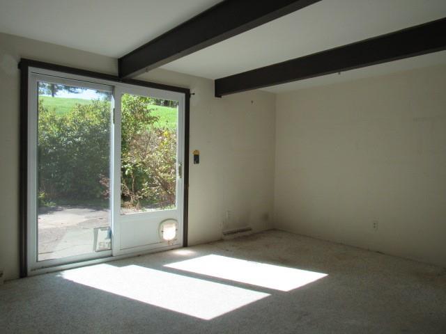 2207 Hall Drive Export, PA 15632 - Photo 8 of 24 a view of empty room with wooden floor and fan