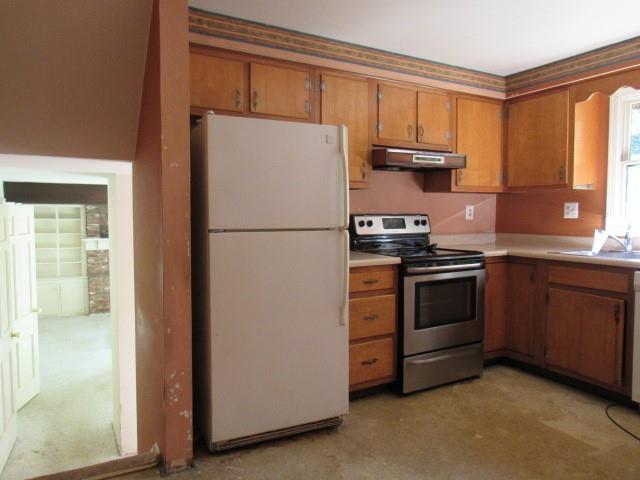 2207 Hall Drive Export, PA 15632 - Photo 10 of 24 a white refrigerator freezer sitting in a kitchen