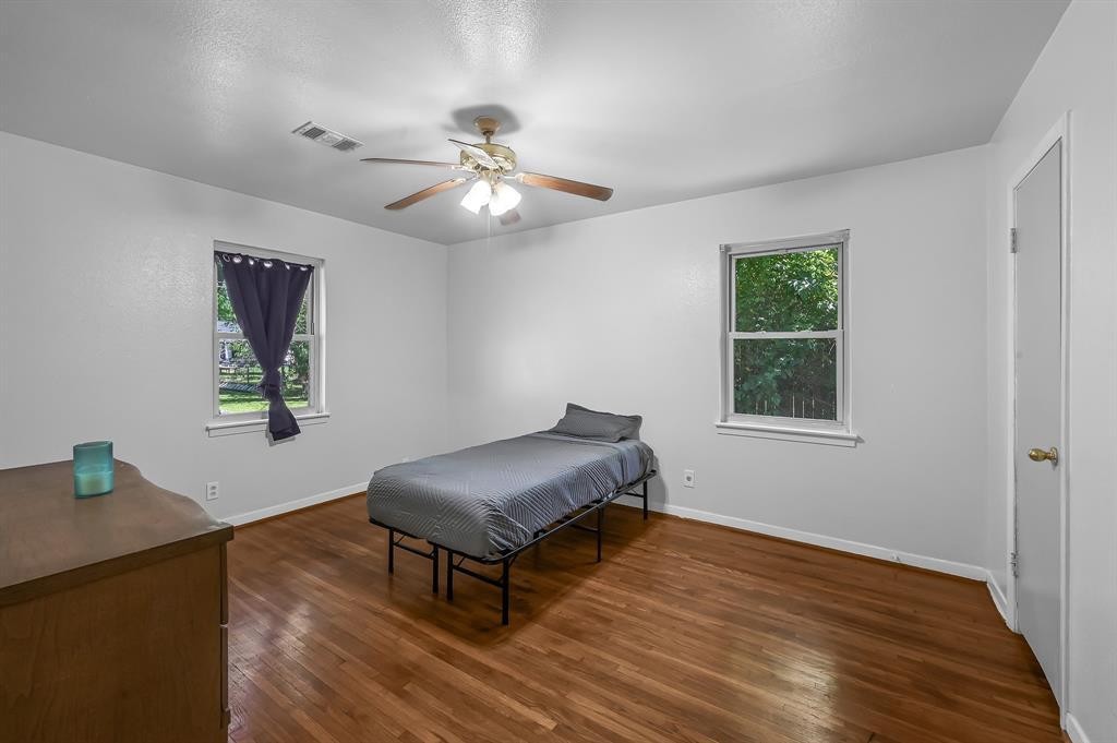 3806 Tilson Lane Houston, TX 77080 - Photo 11 of 13 a living room with furniture and a window