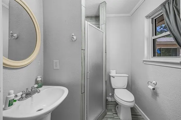 a bathroom with a toilet and a sink