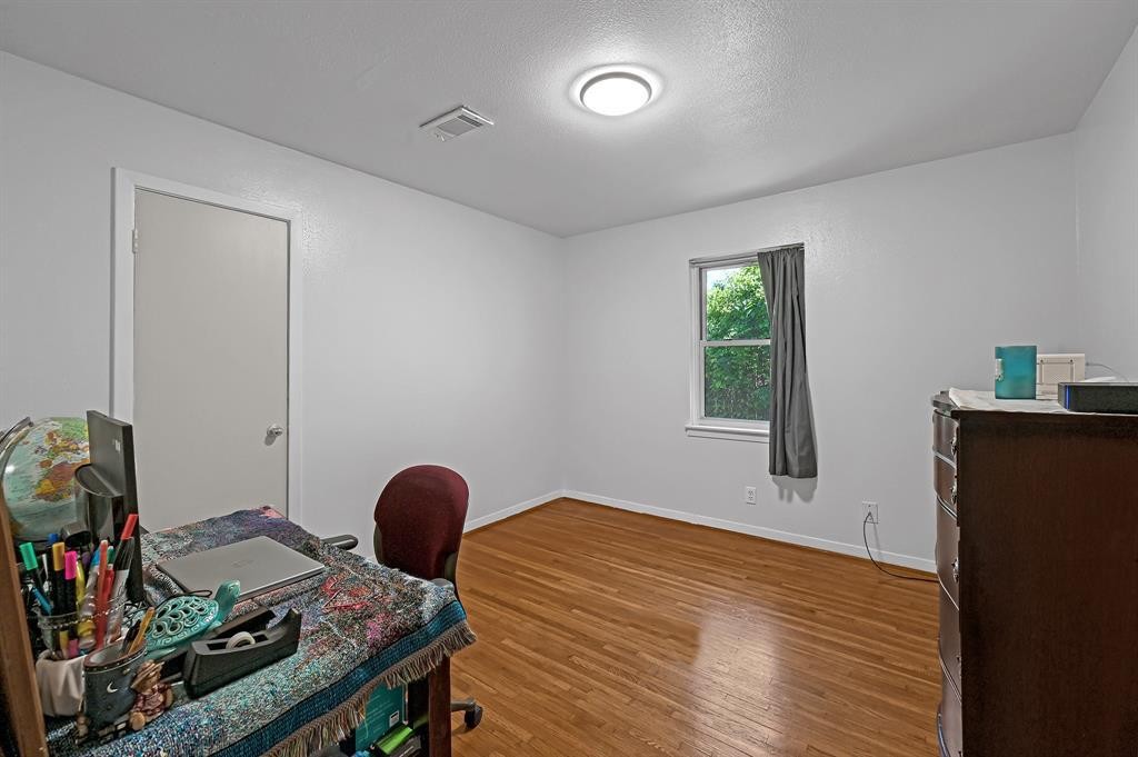 3806 Tilson Lane Houston, TX 77080 - Photo 10 of 13 a workspace with furniture and window