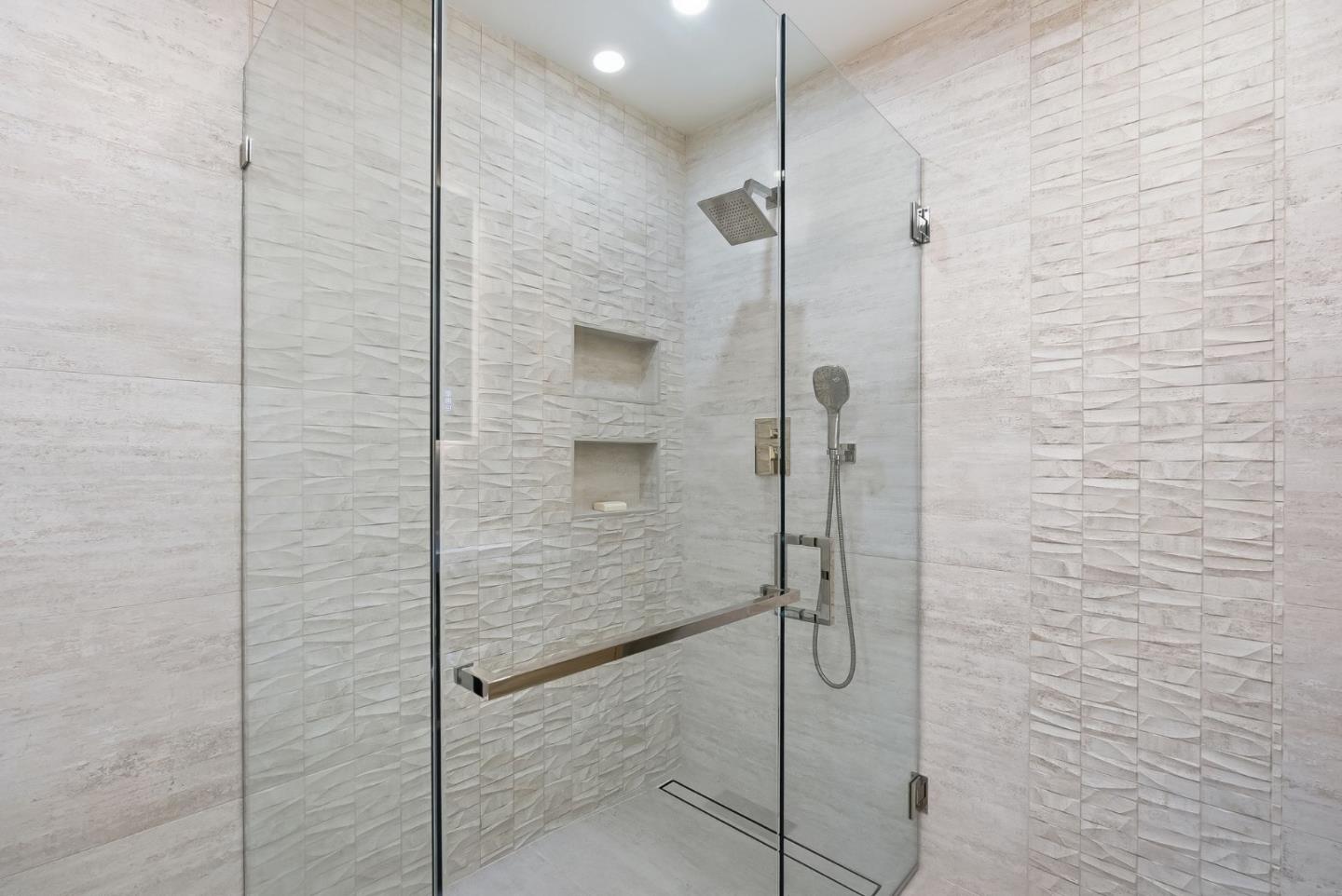845 Pollard Road Los Gatos, CA 95032 - Photo 27 of 47 a bathroom with a shower and a sink
