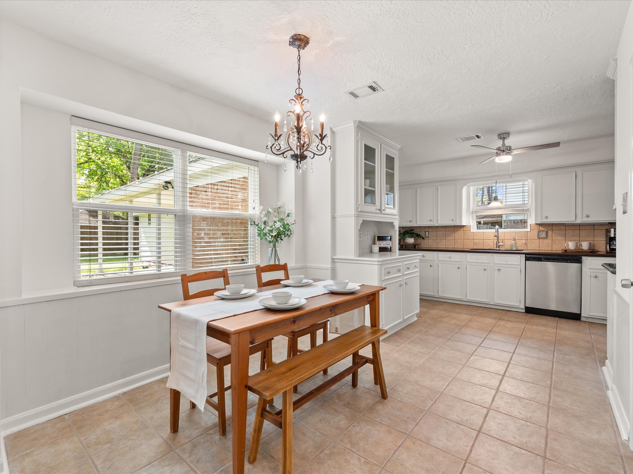 5223 Ashmere Lane Spring, TX 77379 - Photo 14 of 50 A bright breakfast room just off the kitchen—perfect for everyday meals or hosting.