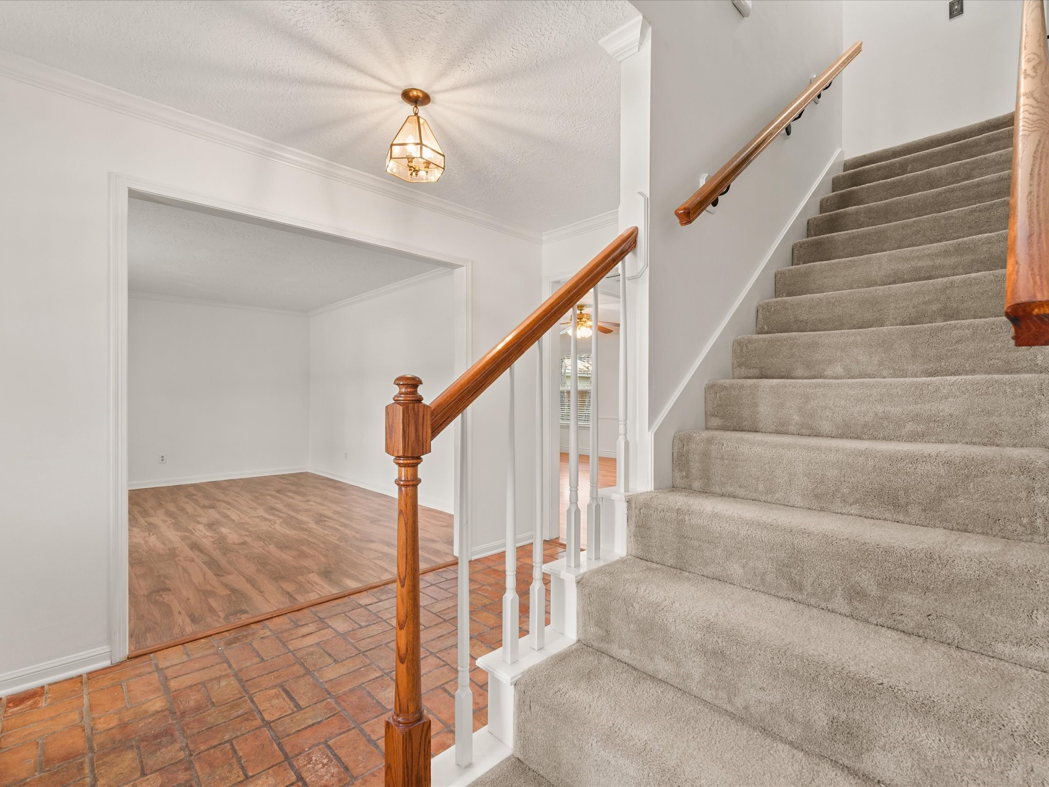 5223 Ashmere Lane Spring, TX 77379 - Photo 24 of 50 A central staircase connects the home, leading to 4 bedrooms and 2 baths - thoughtfully located together.