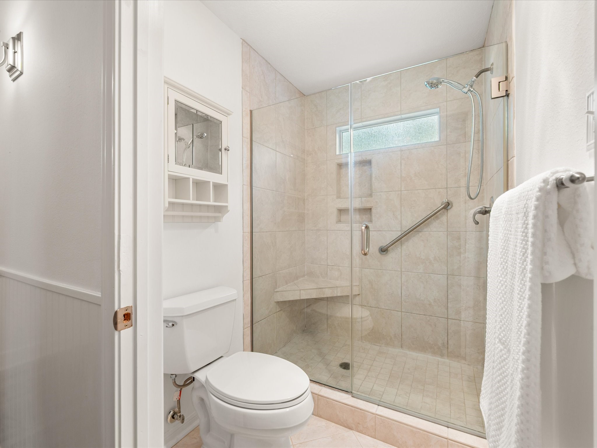 5223 Ashmere Lane Spring, TX 77379 - Photo 28 of 50 A spacious walk-in shower designed for both comfort and ease.