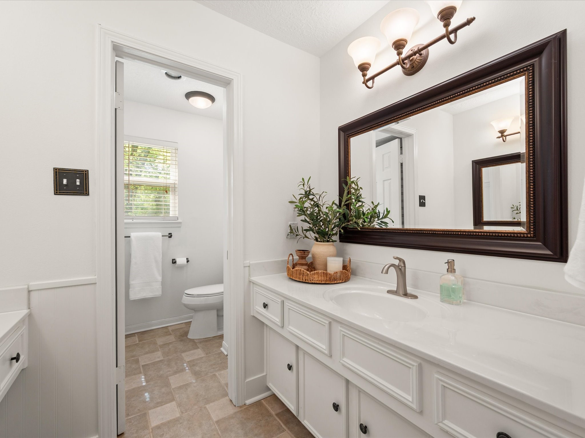 5223 Ashmere Lane Spring, TX 77379 - Photo 38 of 50 A clean and functional secondary bathroom offers a clean and functional space with ample counter space & storage. You'll love the dedicated vanity area for added space.