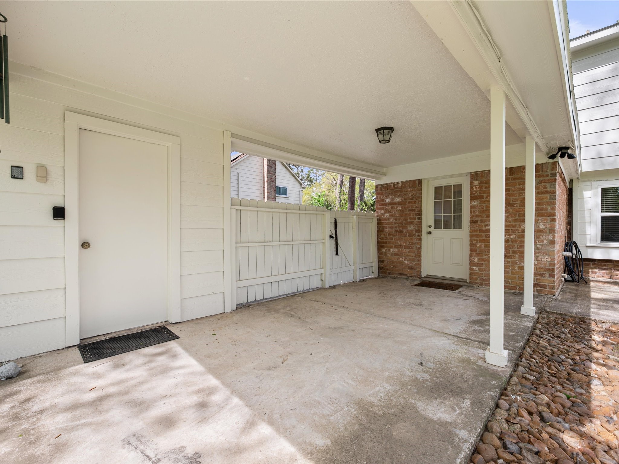 5223 Ashmere Lane Spring, TX 77379 - Photo 40 of 50 The backyard features a spacious patio and covered walkway to the detached garage.