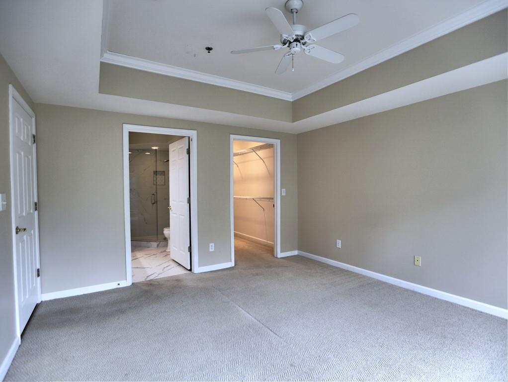 3636 Habersham Road Northwest, Unit 2308 Atlanta, GA 30305 - Photo 14 of 43 a view of an empty room with a window