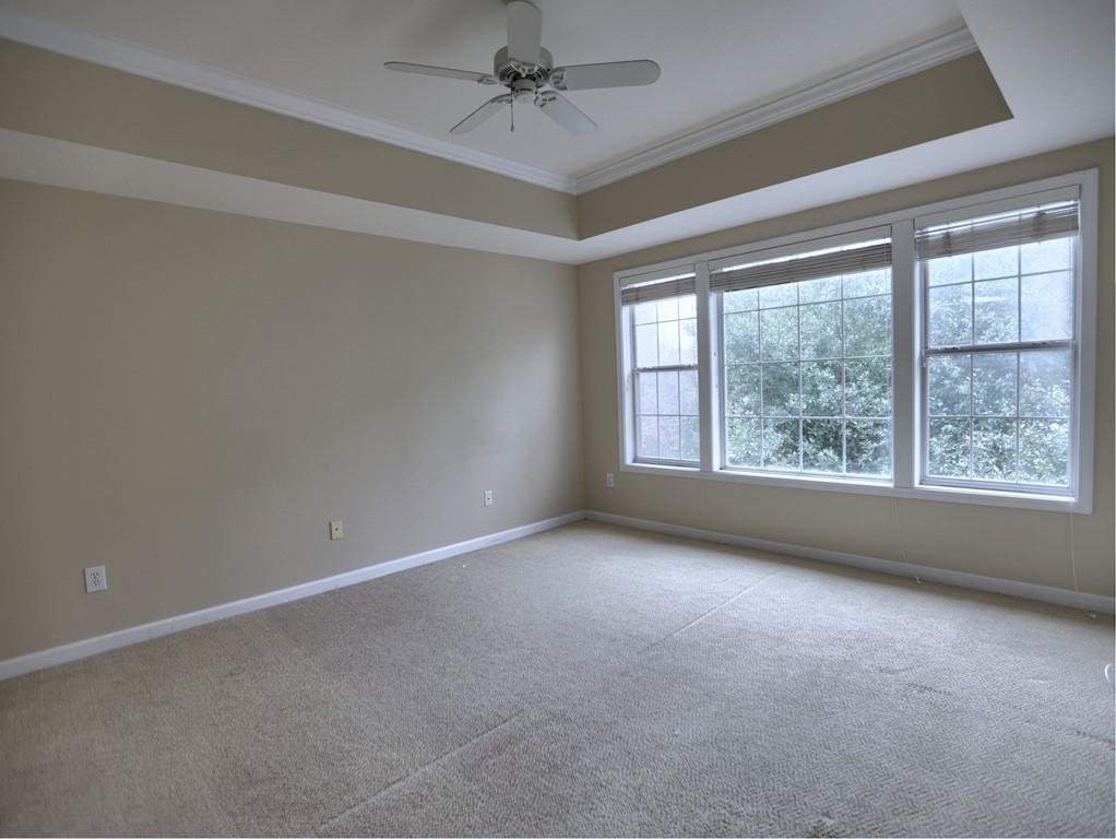 3636 Habersham Road Northwest, Unit 2308 Atlanta, GA 30305 - Photo 15 of 43 an empty room with a empty space and windows