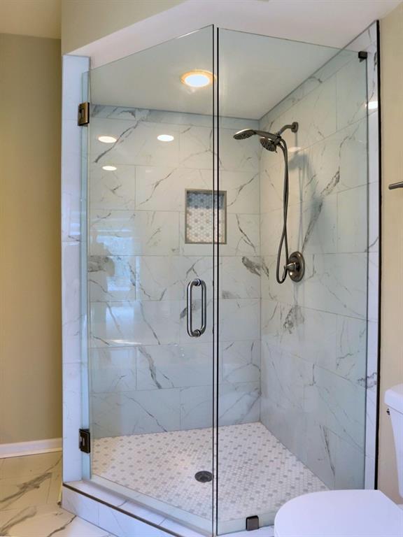 3636 Habersham Road Northwest, Unit 2308 Atlanta, GA 30305 - Photo 17 of 43 a bathroom with a shower