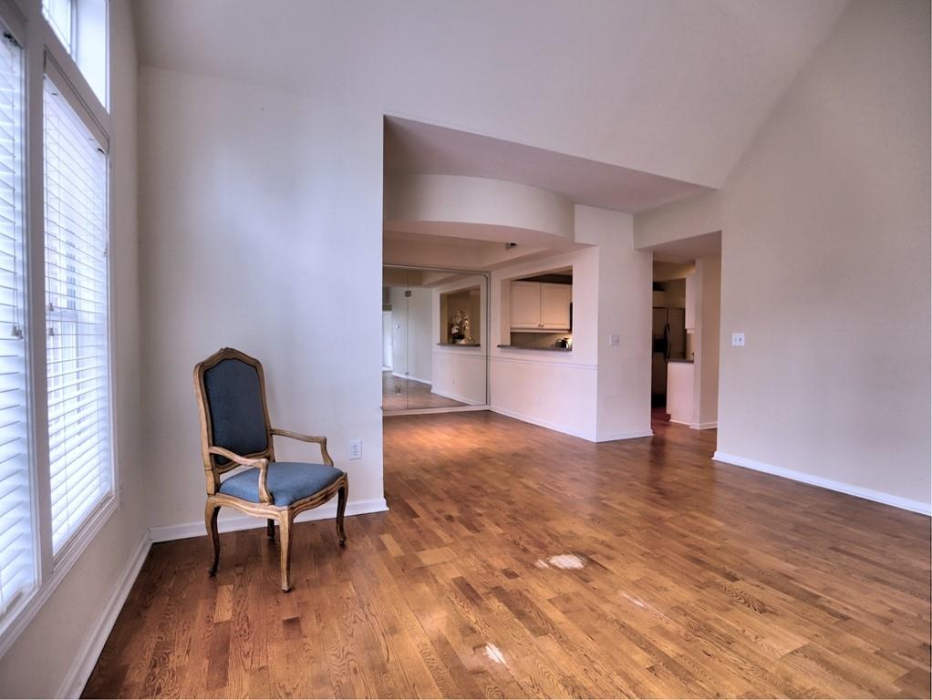 3636 Habersham Road Northwest, Unit 2308 Atlanta, GA 30305 - Photo 3 of 43 a view of a workspace with furniture and a window