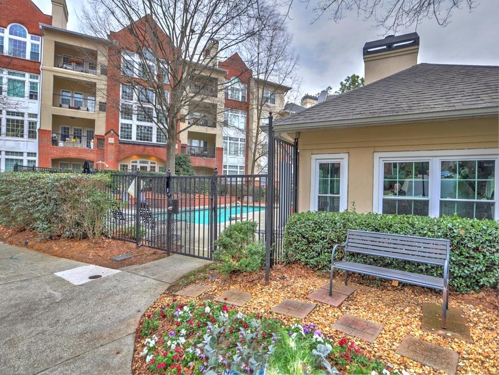 3636 Habersham Road Northwest, Unit 2308 Atlanta, GA 30305 - Photo 31 of 43 a garden view with a seating space