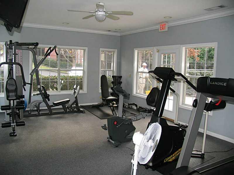 3636 Habersham Road Northwest, Unit 2308 Atlanta, GA 30305 - Photo 34 of 43 a view of a room with gym equipment