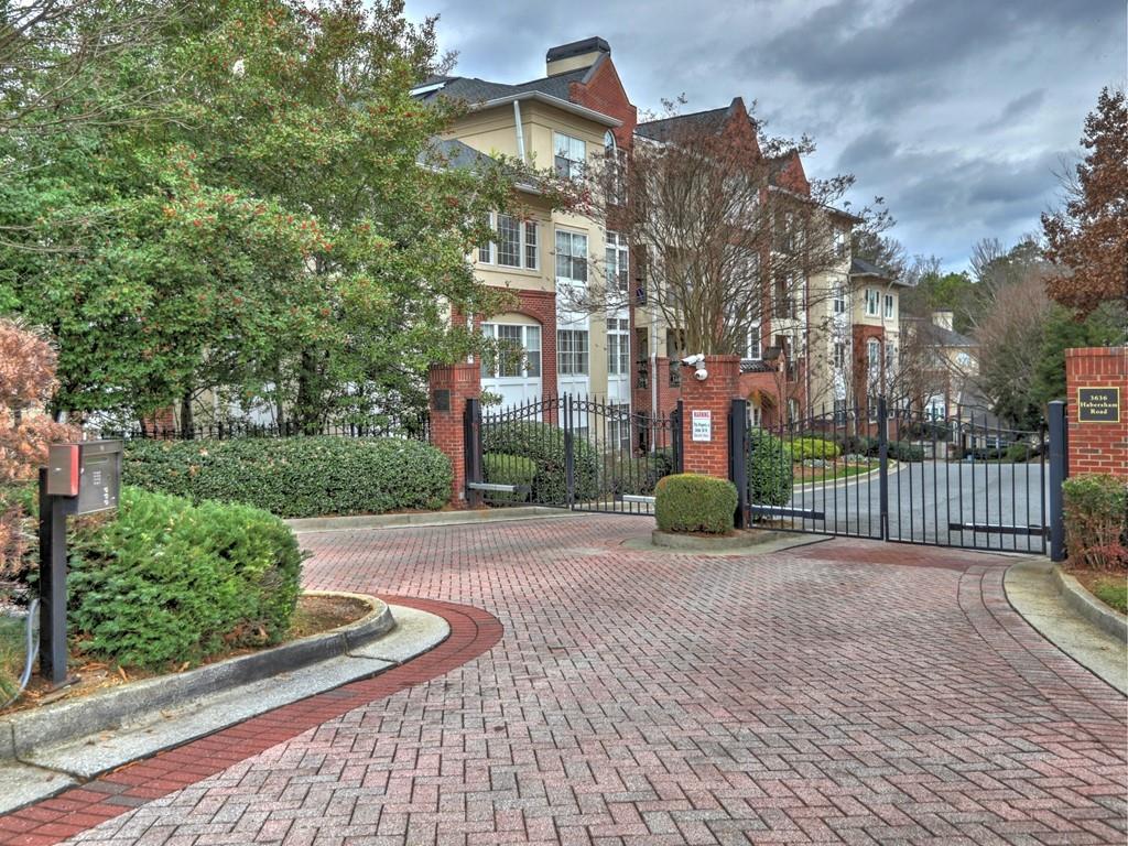 3636 Habersham Road Northwest, Unit 2308 Atlanta, GA 30305 - Photo 41 of 43 a view of a building with pathway