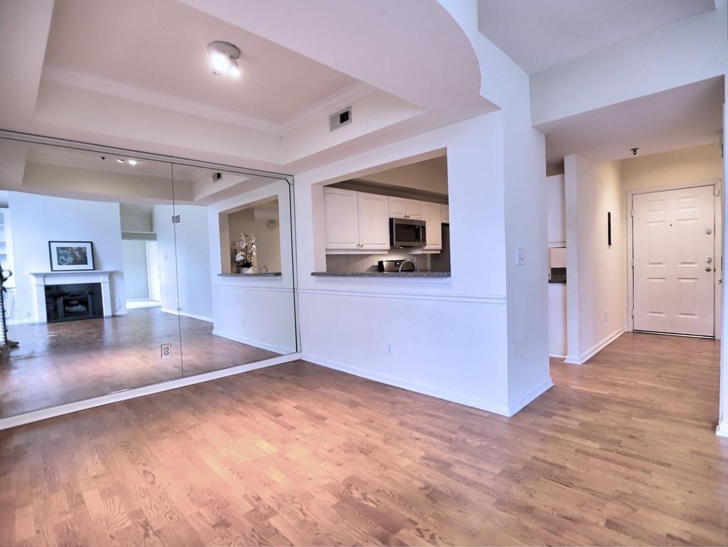 3636 Habersham Road Northwest, Unit 2308 Atlanta, GA 30305 - Photo 43 of 43 a view of a kitchen with a sink and a fireplace