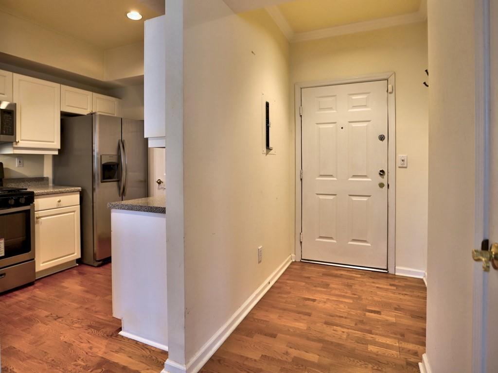 3636 Habersham Road Northwest, Unit 2308 Atlanta, GA 30305 - Photo 8 of 43 a view of a kitchen cabinets and stainless steel appliances