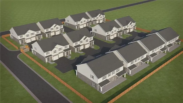 an aerial view of a house with a garden