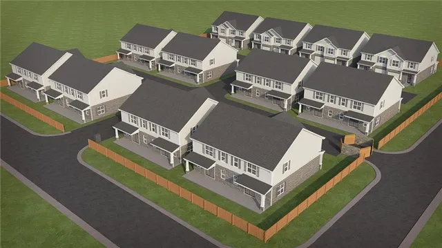 an aerial view of a house with a swimming pool