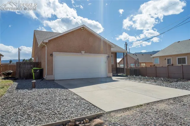 a view of a house with a snow