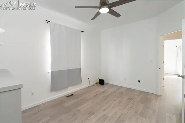 a view of a room with an empty space