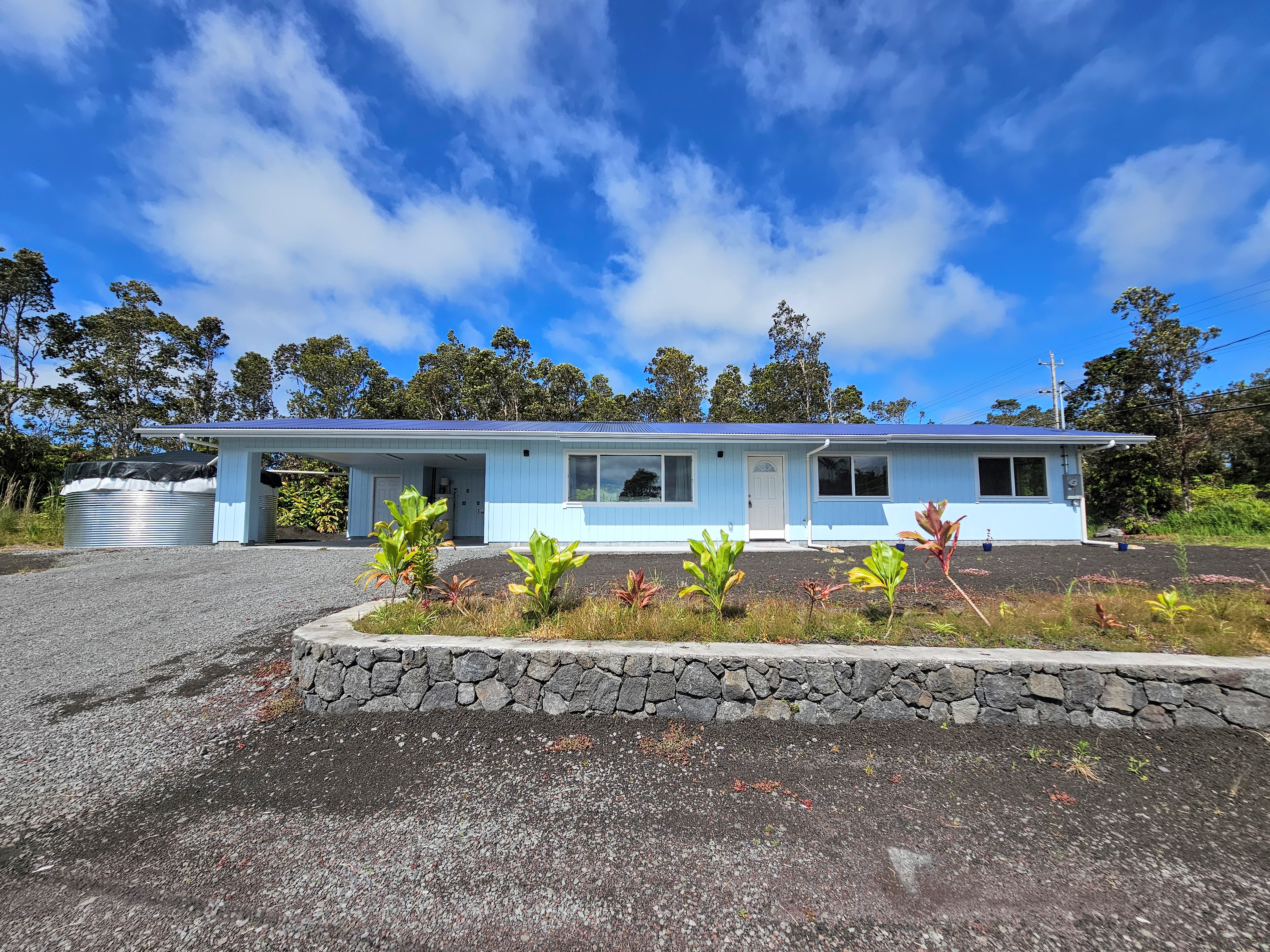 11-3387 Old Volcano Road Volcano, HI 96785 - Photo 2 of 24 a front view of house with outdoor space