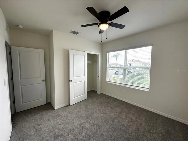 a view of a lake from a yard