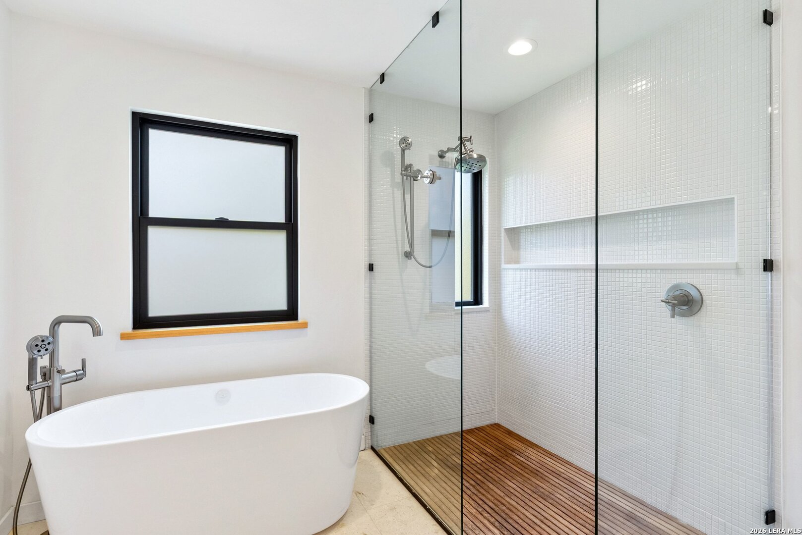 1402 Hutto Road Georgetown, TX 78626 - Photo 28 of 34 a bathroom with a bathtub and a shower