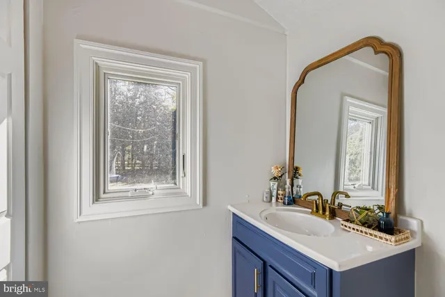 a large white room with a large window