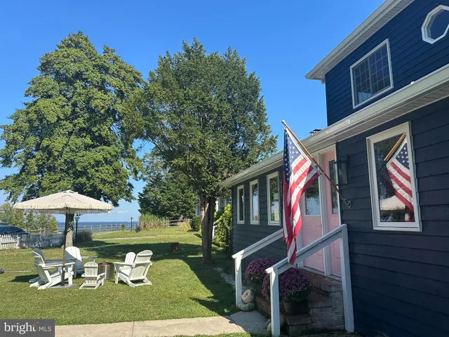 a bathroom with a sink a toilet and a shower