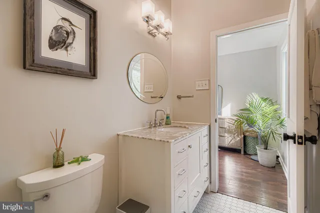 a kitchen with stainless steel appliances a stove microwave and refrigerator