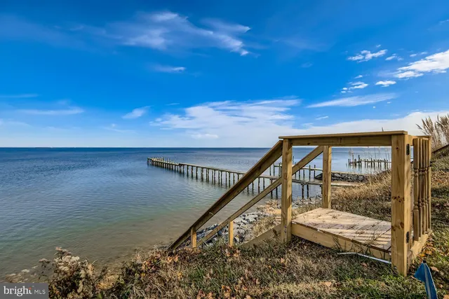 a balcony with view of ocean