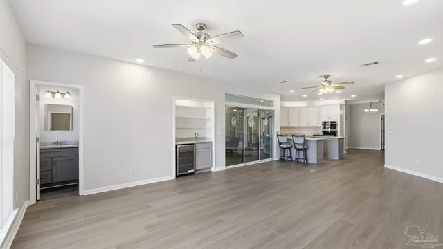 a view of a livingroom with a furniture chandelier