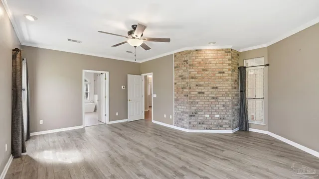 a view of livingroom with hardwood floor and ceiling fan