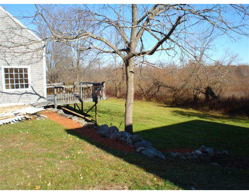 32 River Road Wayland, MA 01778 - Photo 3 of 8 a view of back yard of the house