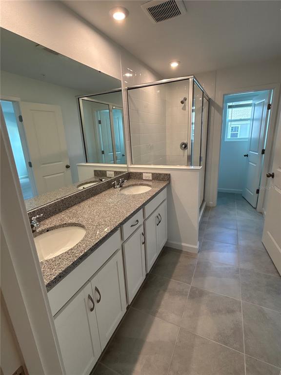 4232 Sadler Road Apopka, FL 32712 - Photo 9 of 17 Owner's Bathroom