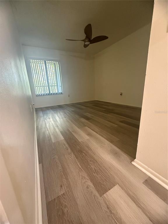 11707 Raintree Village Boulevard, Unit C Temple Terrace, FL 33617 - Photo 12 of 31 a view of empty room with windows