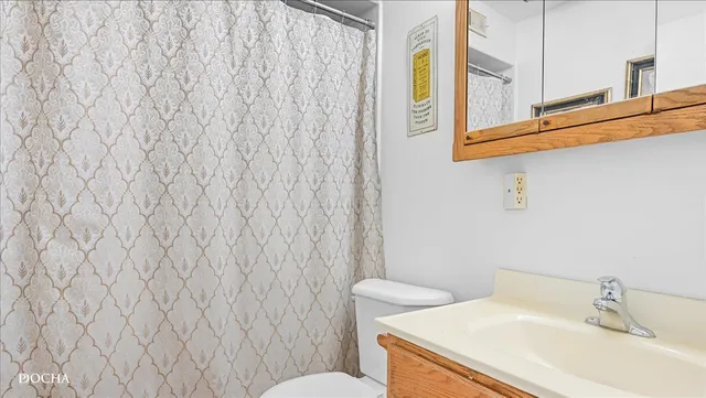 a bathroom with a sink and a toilet