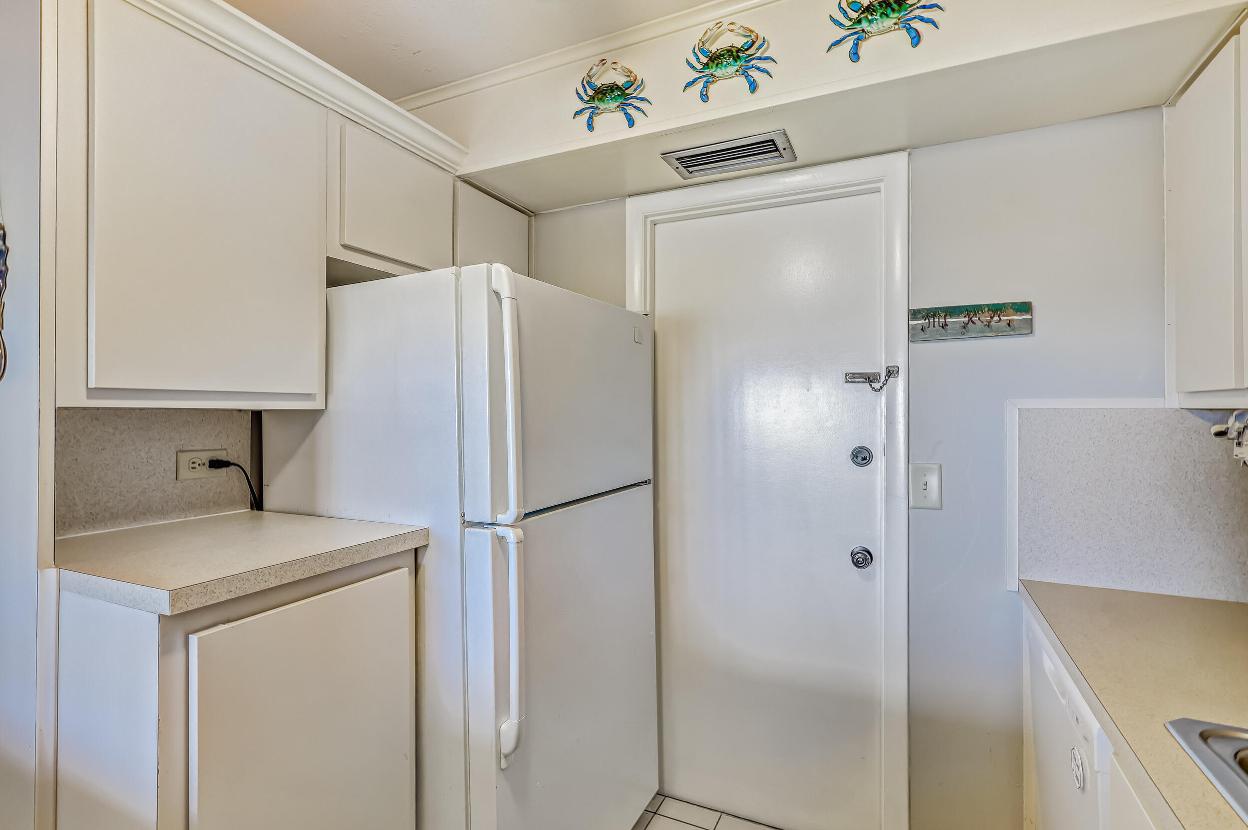 630 Ocean Drive, Unit 403 Juno Beach, FL 33408 - Photo 9 of 25 Kitchen