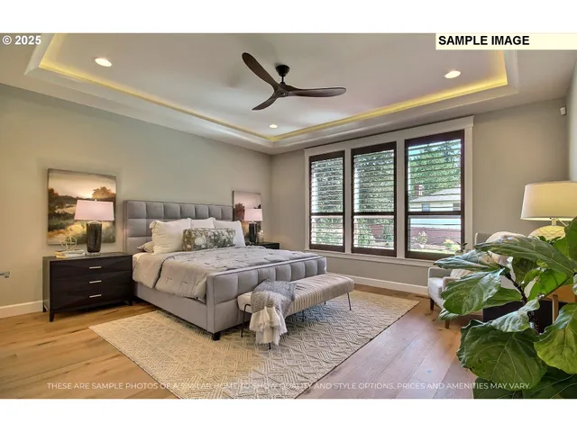 a spacious bedroom with a large bed and a window