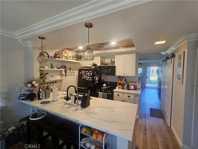 a bathroom with a sink mirror vanity and toilet