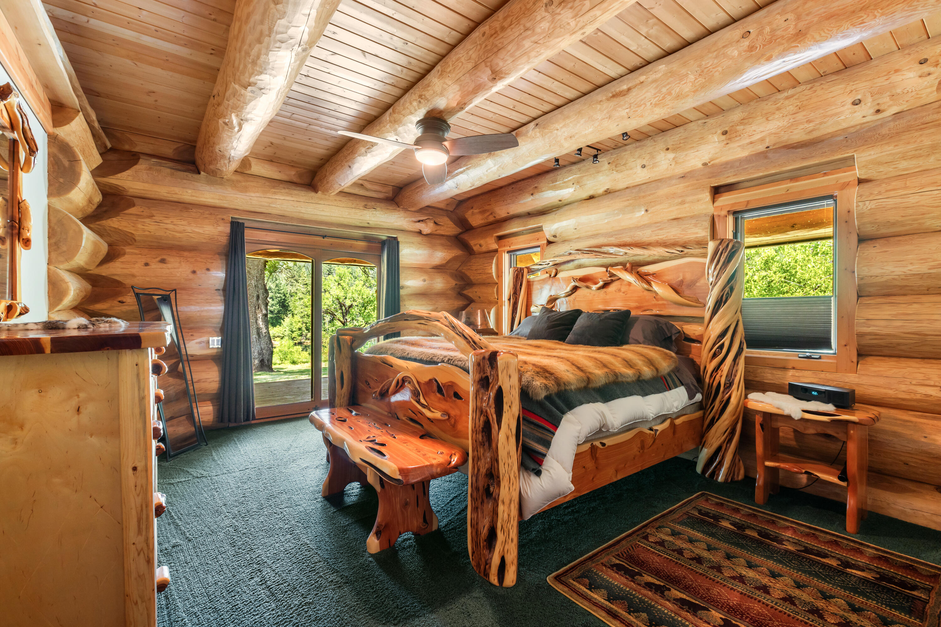 0 Summit Lake Road Montgomery Creek, CA 96065 - Photo 14 of 41 a bedroom with a bed next to a window