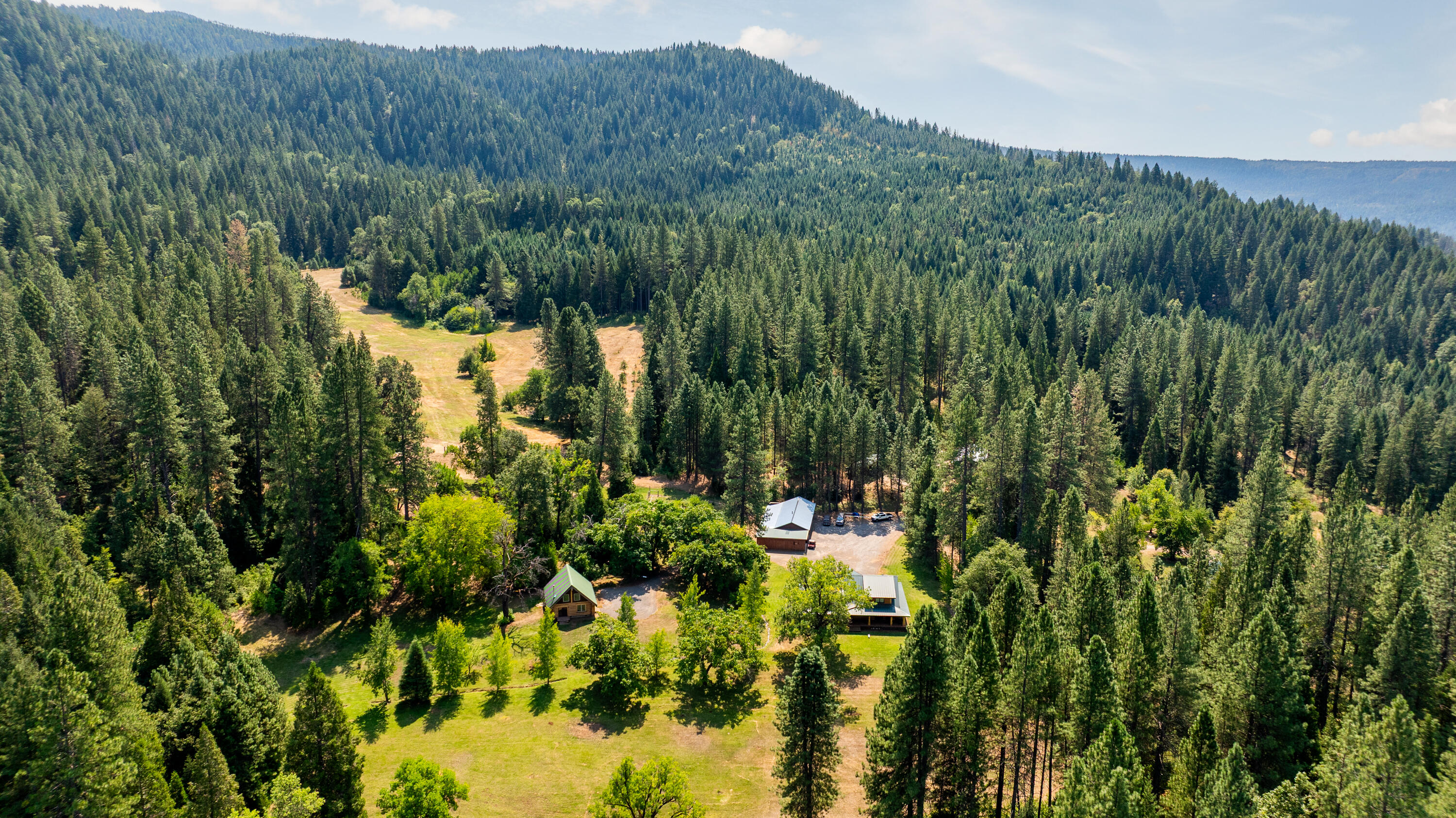 0 Summit Lake Road Montgomery Creek, CA 96065 - Photo 21 of 41 a view of a lake with a mountain in the back yard