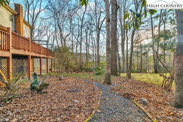 a backyard of a house with lots of green space