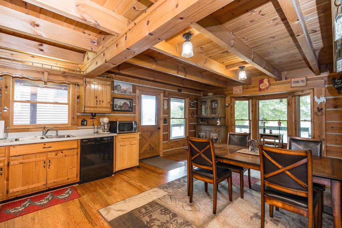 703 Beckwith Road Mount Juliet, TN 37122 - Photo 7 of 29 a kitchen with lots of counter top space and dining table