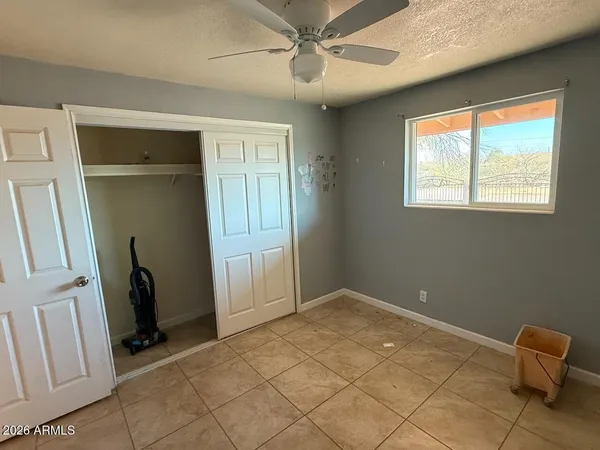 a view of room with window and hardwood floor