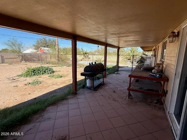 a view of a porch with wooden floor and deck