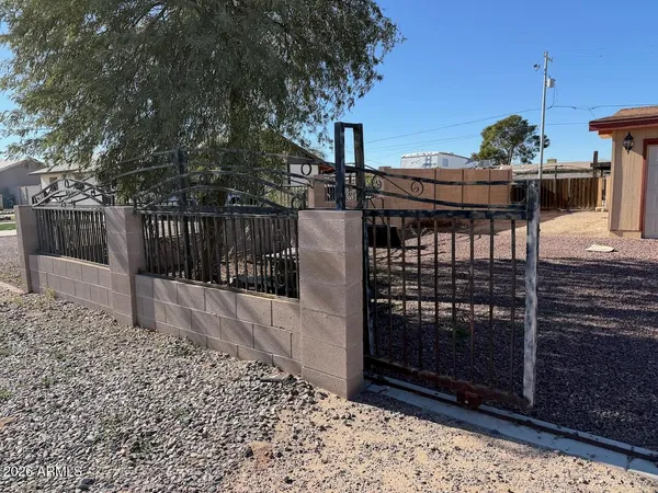 a view of a balcony with a potted plant