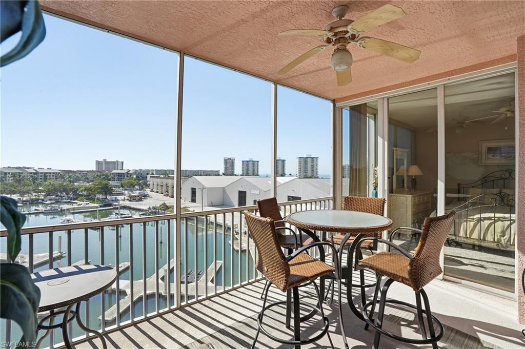150 Lenell Road, Unit 503 Fort Myers Beach, FL 33931 - Photo 12 of 32 a view of a chairs and table in the balcony