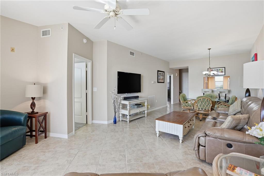 150 Lenell Road, Unit 503 Fort Myers Beach, FL 33931 - Photo 17 of 32 a living room with furniture and a flat screen tv